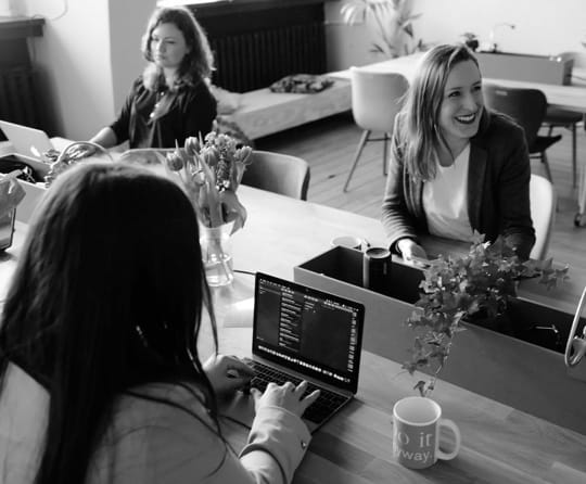 Group of employees working together at the office