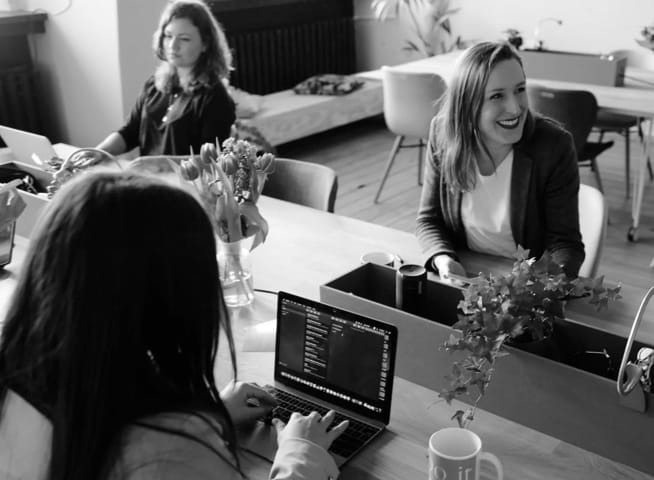 Group of employees working together at the office